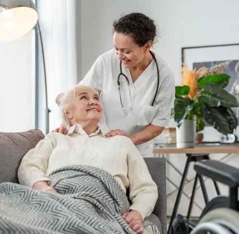 senior-woman-talking-with-her-doctor-remote-medical-care-mobile-apps-development-casestudy-bmv-system-integration